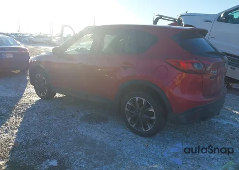 2016 Mazda Cx-5 Grand Touring z USA, uszkodzony, nr VIN JM3KE4DY8G0684475